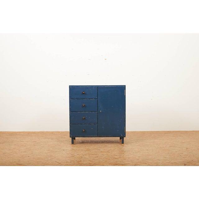 Fir Chest of Drawers with Steel Tube Legs and Wooden Ends, in Worn conditions. Designed 1920 to 1949 This piece is...