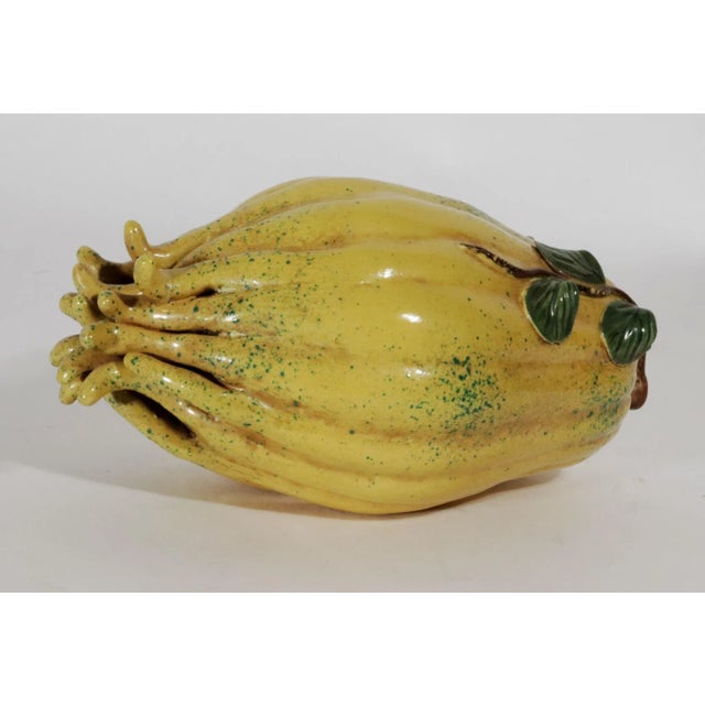 Chinese Porcelain Altar Fruit Box in the form of a Buddha's Hand citron, 19th Century The Chinese Export porcelain altar...