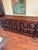 Credenza/Buffet/Sideboard: Vintage Spanish Style Colonial, maple, intricately hand carved (artisan) door and side panels...