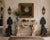 A striking pair of antique Italian Renaissance Revival hall chairs crafted from richly toned walnut and adorned with...