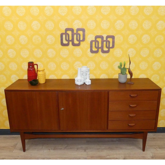 A real eye-catcher! a beautiful, compact little sideboard 1960s in the style of popular danish design manufacturer unknown...