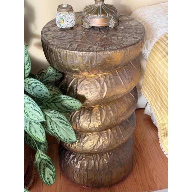 An unusual set of three vintage sculptural brass-clad pedestal or end tables by Maitland-Smith, dating to the late 10th...