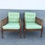 A stylish pair of vintage Hollywood Regency lounge chairs showcasing elegant faux bamboo frames with woven cane side and...