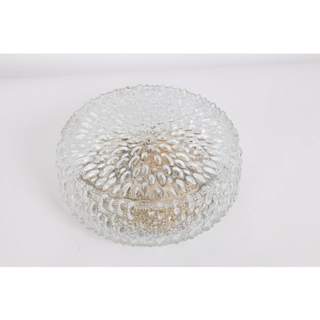 A wonderful flush mount by limburg, germany, 1970s. Special glass form on a metal base. High quality and in very good...