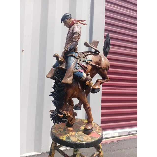 American Hand Painted Cowboy Sculpture With Bucking Bronco on Stool Art Statue For Sale - Image 3 of 9