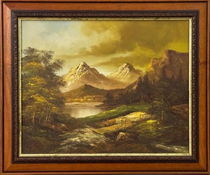 Golden mountain peaks rise above a quiet river where light and solitude meet 1975 Circa