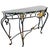 A striking Neoclassical French Empire style console with a contoured serpentine silhouette. Features a thick, beautifully...