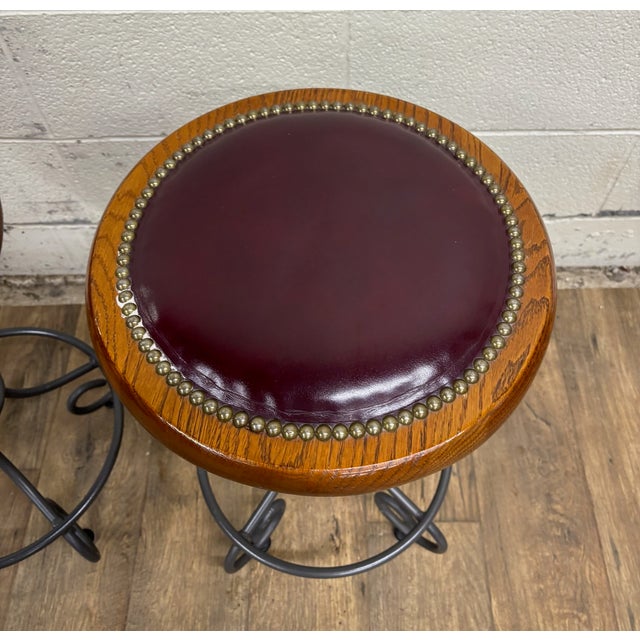 Late 20th Century Vintage Virginia House Oxblood Burgundy Vinyl Nailhead Swivel Backless Barstools For Sale - Image 5 of 15