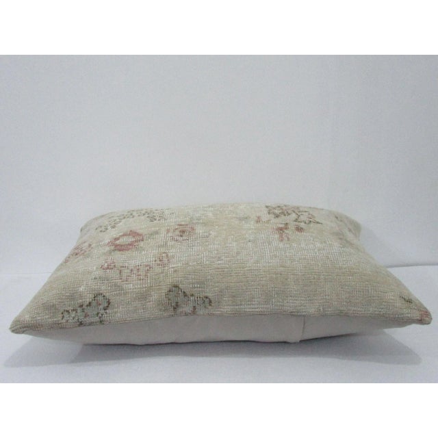 Decorative pillow cover made from a vintage Turkish handknotted rug. Backed with good quality cotton fabric. Pillow...