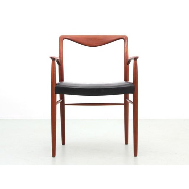 Mid-century modern scandinavian armchair in teak by kai lyngfeldt-larsen. Original seat in black leather. Year 1960'...