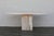 Striking vintage Italian Postmodern console table, circa 1970s, crafted entirely from beautiful beige travertine stone....