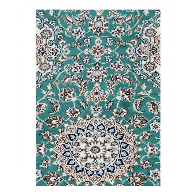 Nain rugs are renowned for their detail and fine use of outlining along the central motifs. Breaking from the classical...