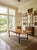 Bring timeless mid-century craftsmanship into your home with this stunning 1970s Ethan Allen solid maple draw-leaf dining...