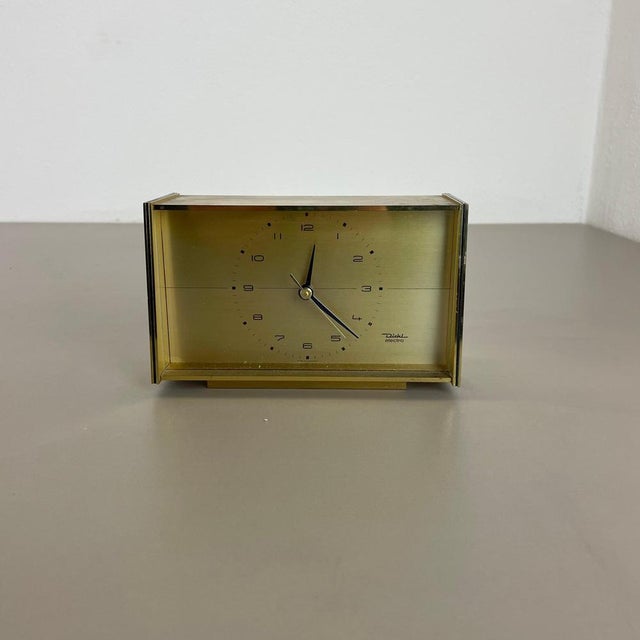 Article: Table clock Origin: Germany Producer: Diehl Electro, Germany Age: 1960s This original vintage table clock was...