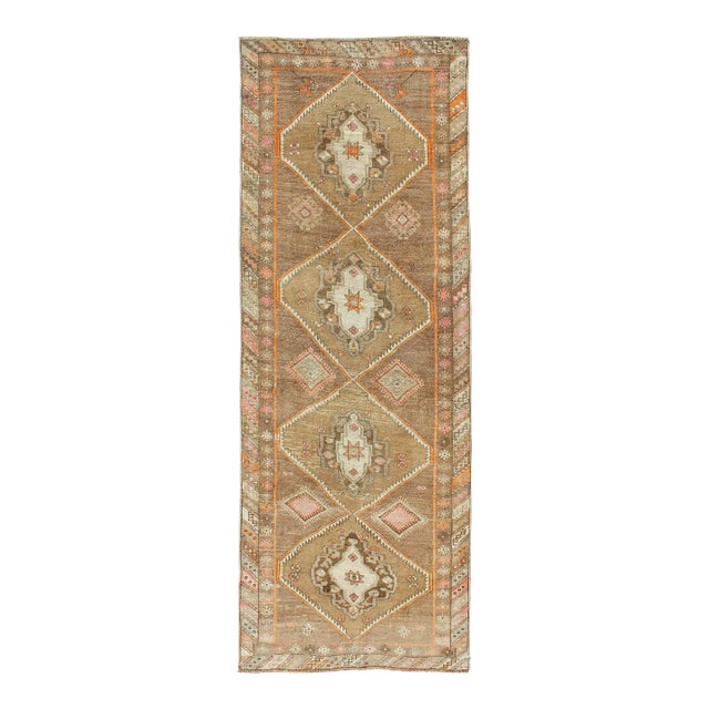 Vintage Hand Knotted Turkish Oushak Runner With Tribal Medallions in Earthy Tones For Sale