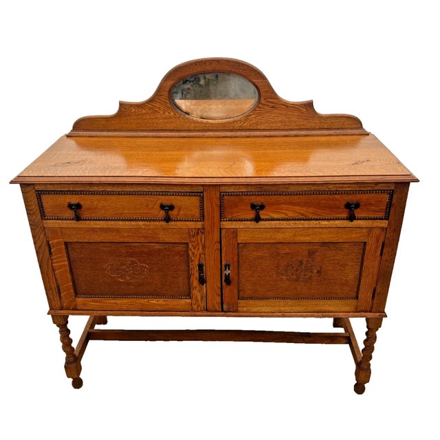 Bring timeless English character to your dining room, entryway, or living space with this charming Antique Jacobean...