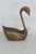 This highly charming Swan Figurine is made out of brass. This adorable metal swan figurine presents a highly elegant...
