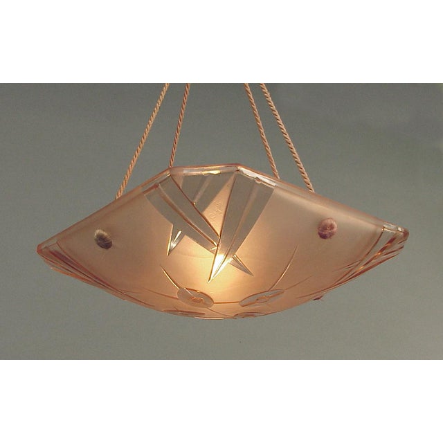 Here’s a cool item -- a peach glass, eight-sided lighting bowl (four sides large, four sides small, but still 8-sided!),...