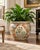 An exquisite vintage Chinese porcelain fishbowl planter featuring elaborate Famille Rose-style decoration, richly accented...