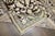 An intermediate-size Persian Malayer Formal rugs featuring pops of green