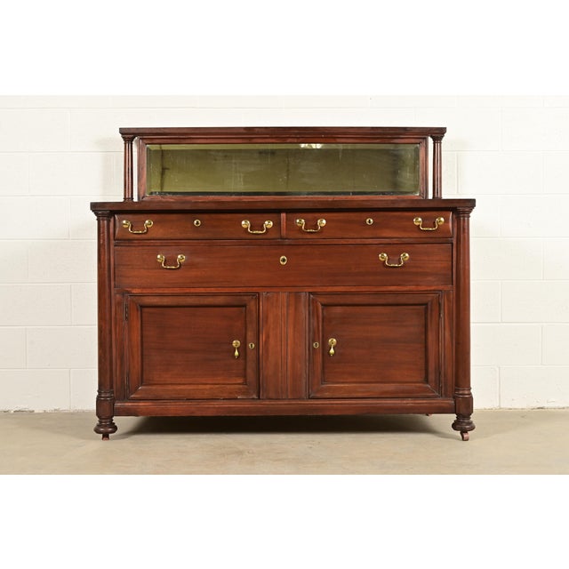 An exceptional American Empire or Victorian sideboard, credenza, buffet server, or bar cabinet In the manner of R.J....