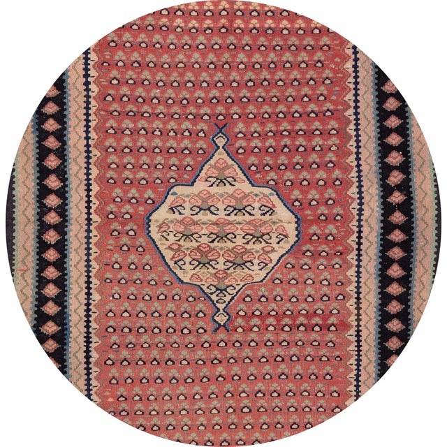 A beautiful hand-woven vintage Kilim runner with a tan field, and multi-color accents an all-over medallion design. This...
