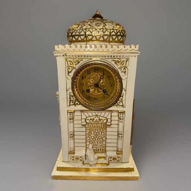 This listing is for a gorgeous antique French mantel clock. The clock has a unique orientalist design with features...
