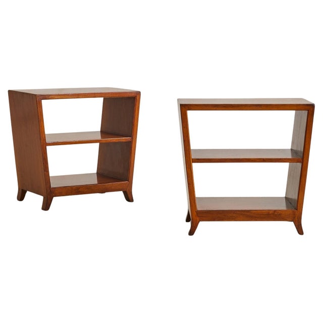 A 1950s Italian walnut bedside table attributed to Gio Ponti for Schirolli. Defined by its architectural silhouette, the...