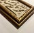 Presenting a stunning piece of Arabic calligraphy art, delicately carved on a polished marble slab. This elegant artwork...