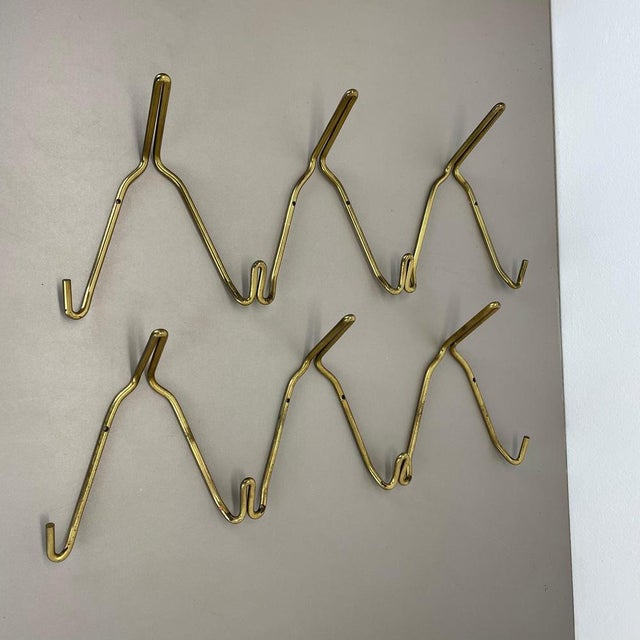 Article: Auböck Style wardrobe element 1 of 2 Origin: France Age: 1950s This original vintage Bauhaus Style wardrobe hook...