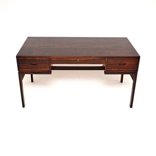A stunning and extremely well made vintage Danish desk by Arne Wahl Iversen. It was made in Denmark by Vinde Mobelfabrik,...