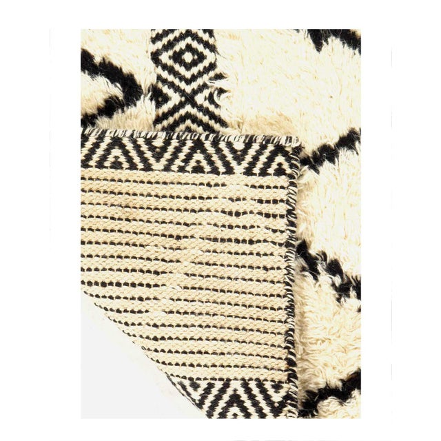 This Moroccan with the warmth, mystery and tribal rhythms of culture, inspired by authentic Moroccan rug designs, has...