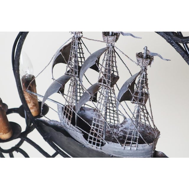 This lamp is made of wrought iron, and it's a perfect example of the amazing artistic and craftsmanship of the 19th...