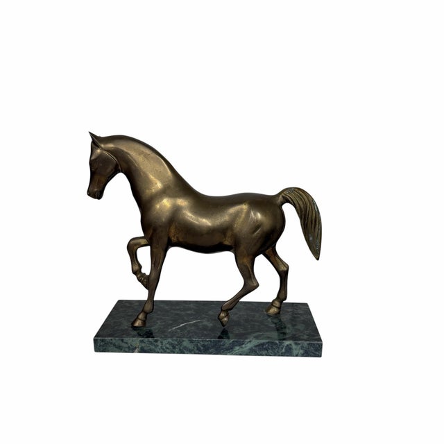 Vintage mid century brass on marble base prancing horse. Measures 9” w x 3.5” d x 8.5” h. Displays well with but not...