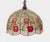 A decorative stained glass pendant chandelier, in the Tiffany revival taste of the mid-20th Century, featuring a domed...