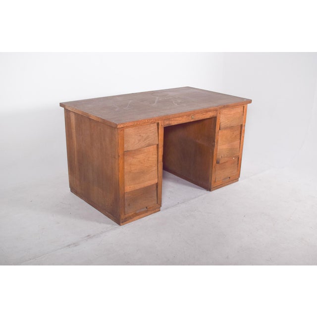 Portuguese desk from the first half of the 20th century. With a robust and functional structure, representative of...