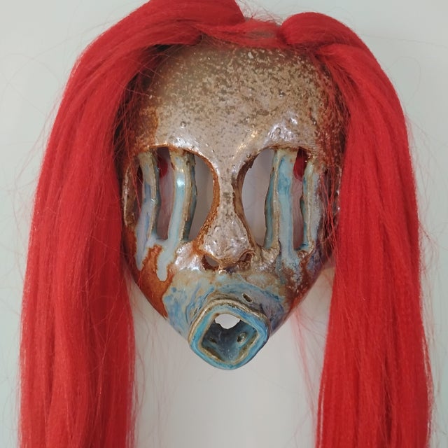 This striking piece is titled "Crimson Ghost", created by self-taught American outsider ceramic artist Joel Huff. Artwork...