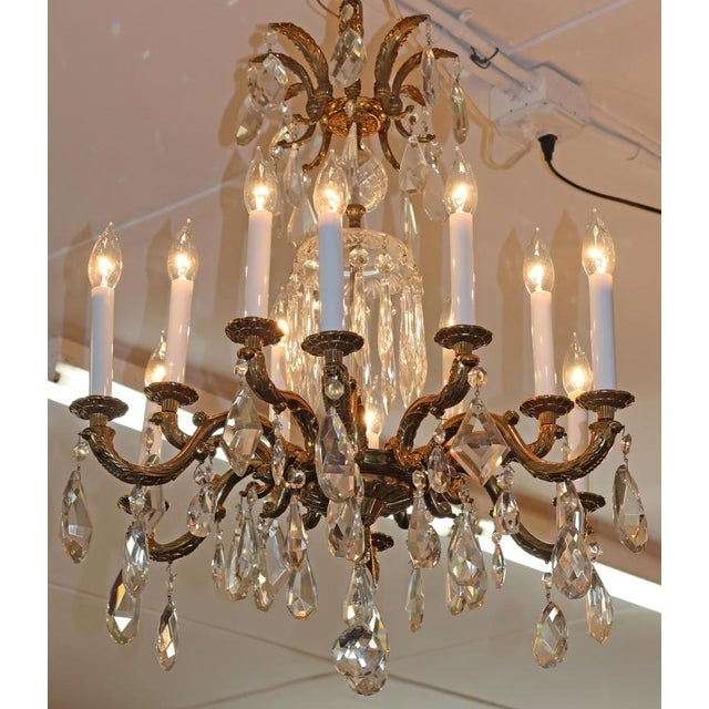 1950's Hollywood Regency French Style Brass & Crystal 12 Light Chandelier Dimensions : 29" Tall X 23" Wide X 23" Deep Make...