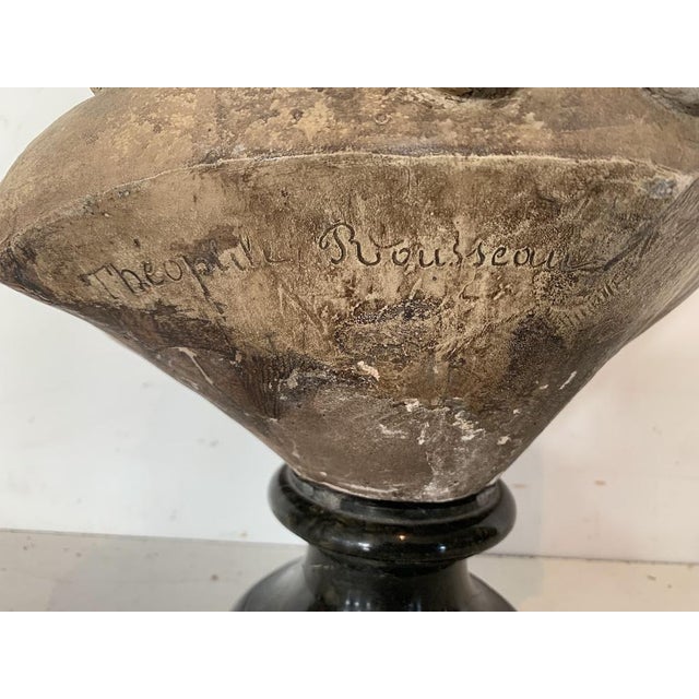 Terracotta bust of a young girl by Théophile Rousseau Black marble base Old restorations (see photos) Dimensions: H 41 x W...