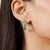 These refined earrings feature 18 round cut Green Onyx gemstones totaling 1.9 carats, beautifully channel set in 925...