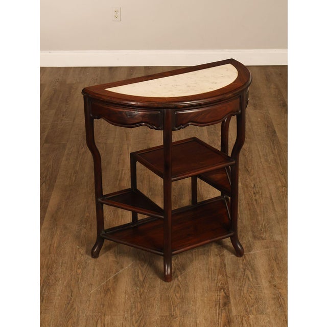 High Quality Asian Style Demilune Side Table Featuring A Shaped Frame With A Marble Inset Top. The Table Has A Half Round...