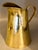 19th-Century French handcrafted brass pitcher. It has a rolled edge, dovetail joined seam and applied handle. This lovely...