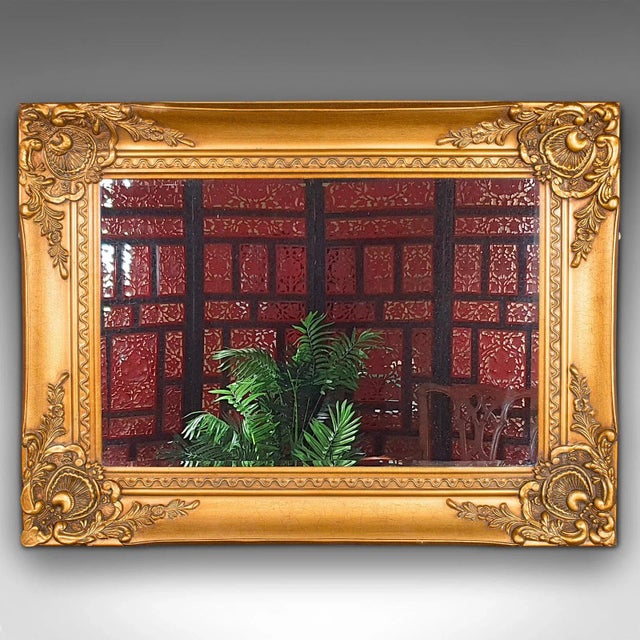 This is a large vintage decorative mirror. A Continental, giltwood wall mirror with Italianate taste, dating to the late...