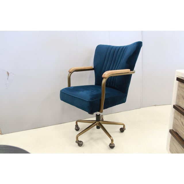 Getting the work done in style! Channel quilting on blue velvet is shown on this chair back. Wooden arm rests on a metal...