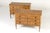 A handsome pair of early 19th italian century italian cherrywood commodes. the commodes have edge-moulded overhanging tops...