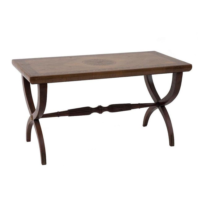 Coffee table is a piece of original design furniture realized in the 20th century by Italian Manufacture. Elegant coffee...