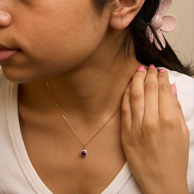 10K Yellow Gold Red Ruby and 1/10 Cttw Diamond Accent Halo Pendant Necklace For Sale - Image 4 of 5