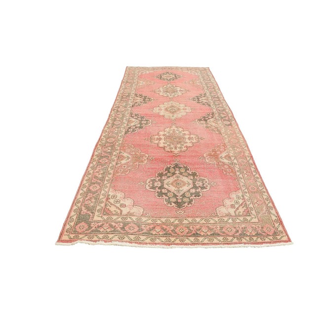 Handknotted vintage wool rug from Oushak region of Turkey. Approximatelly 50-60 years old. In very good condition.