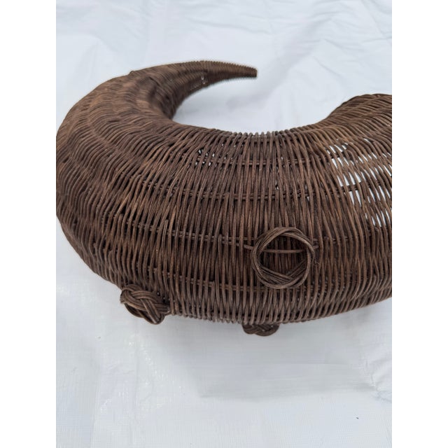 This listing is for an oversized, brown wicker Horn of plenty cornucopia basket for a seasonal tabletop. A rare size and...