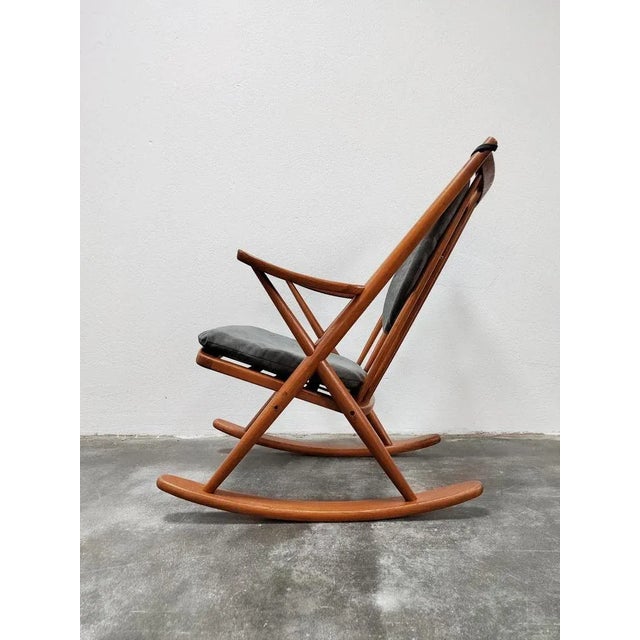 Gorgeous Mid-Century Modern rocking chair designed by Frank Reenskaug for Bramin Mobler. The rocking chair is done in...